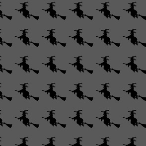 Witch silhouette grey background