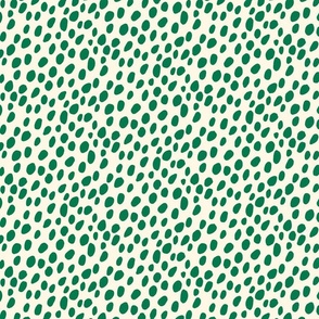 Dalmatian Spots: green dots and spots on cream background.