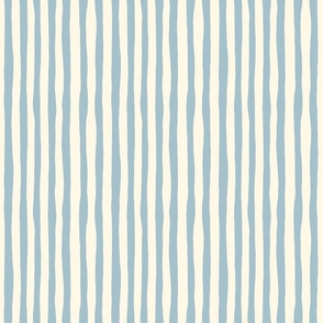 Organic Stripe Design: light blue, imperfect vertical stripes on cream background.