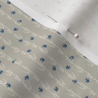 (S) white water plant and navy blue fish in vertical lines on grey