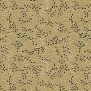 (S) black fish swarm behind beige fishing net on khaki green