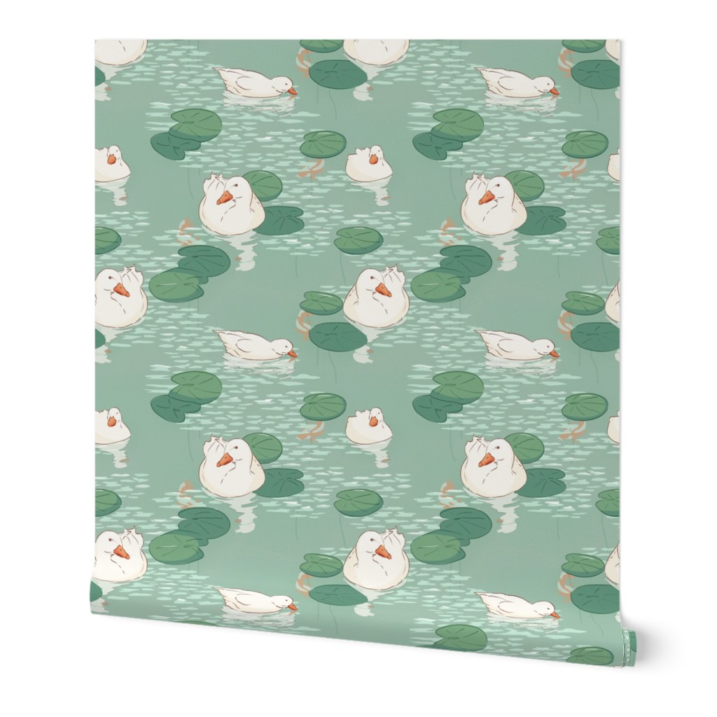 White ducks swimming in lake with lily pads (medium size version)