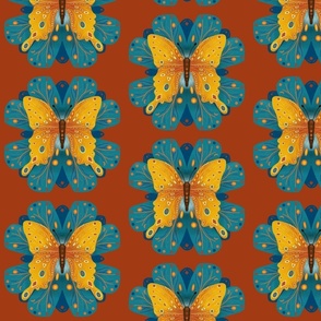 Amber butterfly on teal petals and rust red background
