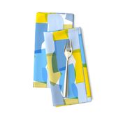 Large-scale overlapping disco confetti abstract shapes in blue, green, and yellow party fabric 