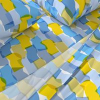 Large-scale overlapping disco confetti abstract shapes in blue, green, and yellow party fabric 