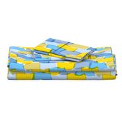 Large-scale overlapping disco confetti abstract shapes in blue, green, and yellow party fabric 