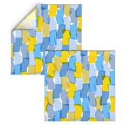 Large-scale overlapping disco confetti abstract shapes in blue, green, and yellow party fabric 