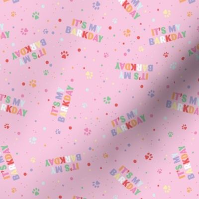 Colorful rainbow barkday design with confetti paws and happy birthday text tossed for dogs on pink girls