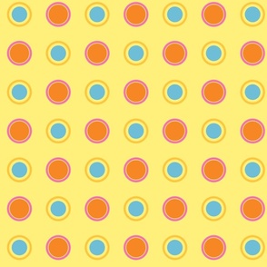 orange, blue and pink dots on yellow