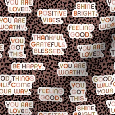 Women's affirmations - powerful quotes and words of wisdom positive vibes and happy text on spots seventies brown palette  