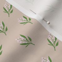 Minimalist boho garden - Lily of the valley flower blossom summer design winter palette pink green on beige sand