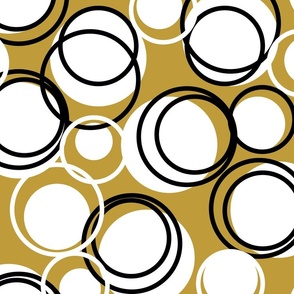 Black and White Circles on Gold Background