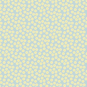 Whimsical Soft Yellow Polka-Dots on a Baby Blue Background