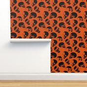 Floating Skulls, Black on Persimmon