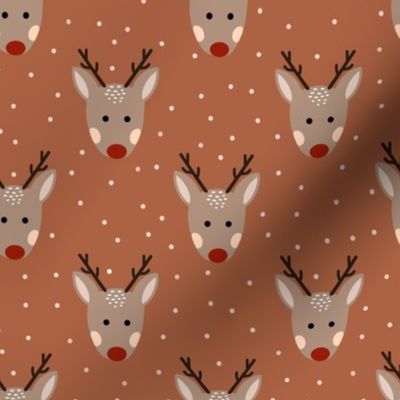 Cute Christmas reindeer on brown with spots 
