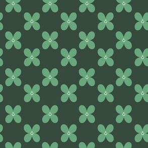 Happy Four Leaf Clovers on Emerald Green with Smiley Faces