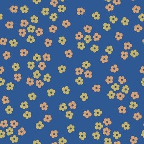Ditsy Flowers in peach and yellow on blue background (medium scale
