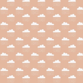 White snow clouds on a tan background