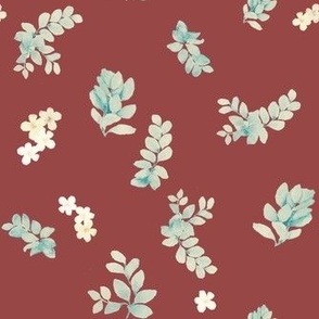 Leaves and wild flowers in deep red background