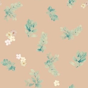 Leaves and wild flowers in nude brown background.