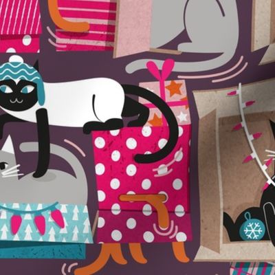 Normal scale // Purfect Christmas gifts // purple beet background cute cats in cardboard fuchsia blush pink and teal wrapped boxes and holiday ornaments ribbons balls and lights 