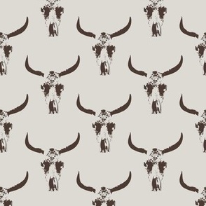 Cow Skull Half Drop, Dark brown on taupe background