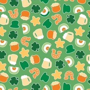 Cute St Paddies icons - colorful kawaii style retro Saint Patrick's Day design with rainbow irish colors shamrock beer and pot with gold stickers green orange blush on jade green