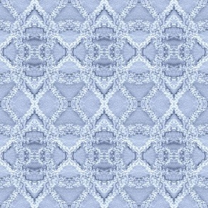 tressage de laine sur toile à canevas en bleu clair