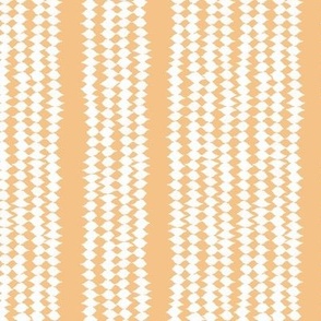 Small organic block printed lino cut in vertical stripes of stacked diamonds in white on soft orange