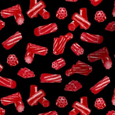 Red Licorice Pieces on Black