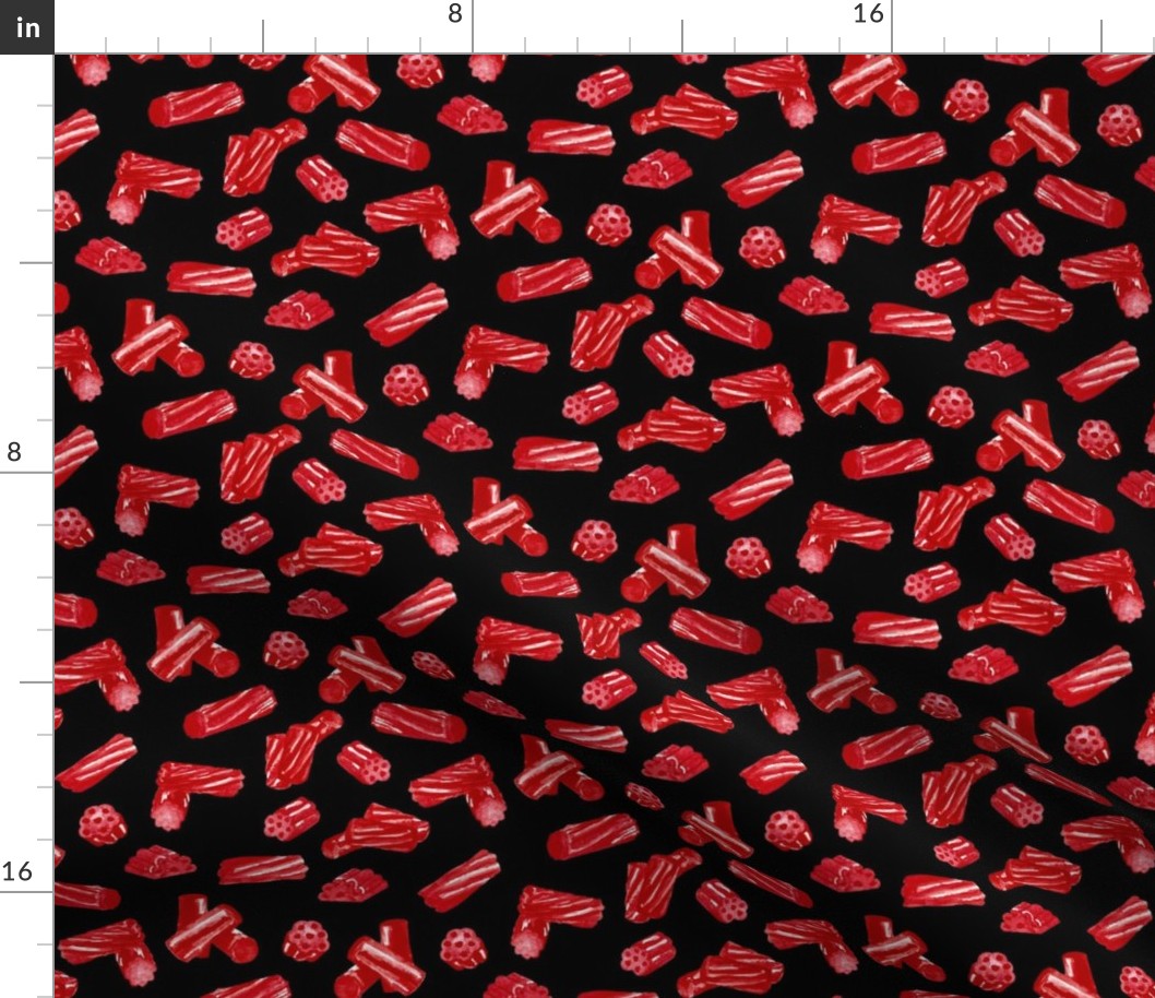Red Licorice Pieces on Black