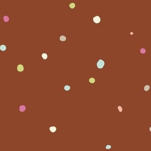 Irregular Random Colorful Polka Dots on Brown Background