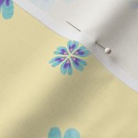 blue and purple heart flowers on a primrose yellow background