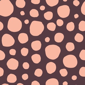 Irregular Random Pink Circles on Brown Background