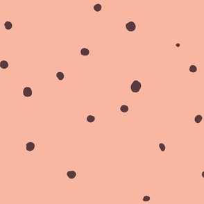 Irregular Random Dark Brown Polka Dots on Salmon Pink Background