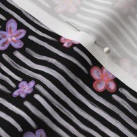 Flowers and stripes on black, daisies