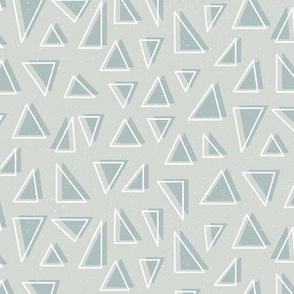 Neutral Geometric Triangle Shapes in Green on a Light Grey Background 