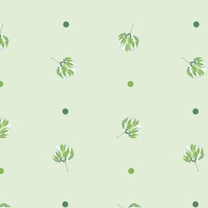 Small soft green daisy buds and polka dots