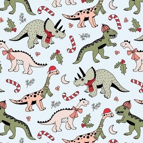 Seasonal Dino friends - Christmas dinosaurs with candy canes scarfs bobble hats and santa hats vintage green beige red palette on soft blue