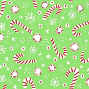 Christmas candy canes on light green normal scale