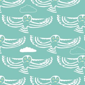 owl flight in teal with clouds