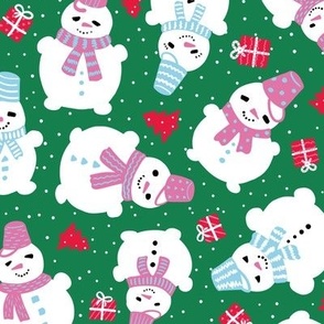 Cute snowman with pink buckets and scarfs and Christmas presents, classic xmas green