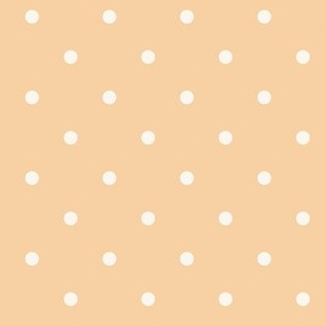 White polka dots on soft pastel yellow