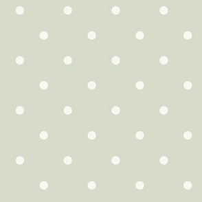 White polka dots on pale pastel light green