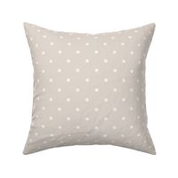 White polka dots on pale pastel taupe 