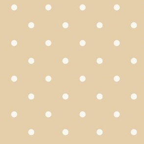 White polka dots on pale pastel mustard yellow