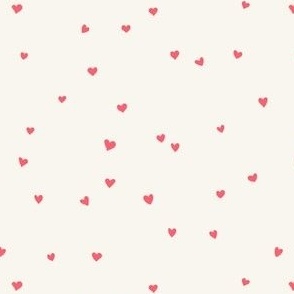 Scattered love hearts Valentine's Day in bright red on cream - SMALL SCALE