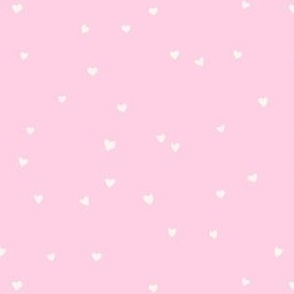 Scattered love hearts Valentine's Day in cream on light pastel pink - SMALL SCALE