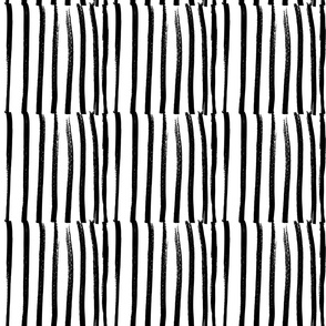 Jumbo scale modern and irregular stripe block print in black and white.