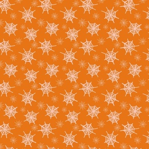 Scattered spiderwebs  -  pastel peach and terracotta orange  //  Small scale